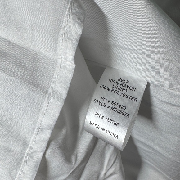 Chic White Backless Dress with Spaghetti Straps - Picture 11 of 13